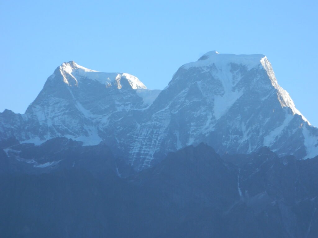 Snow-covered peaks seen from the Kuari Pass trek