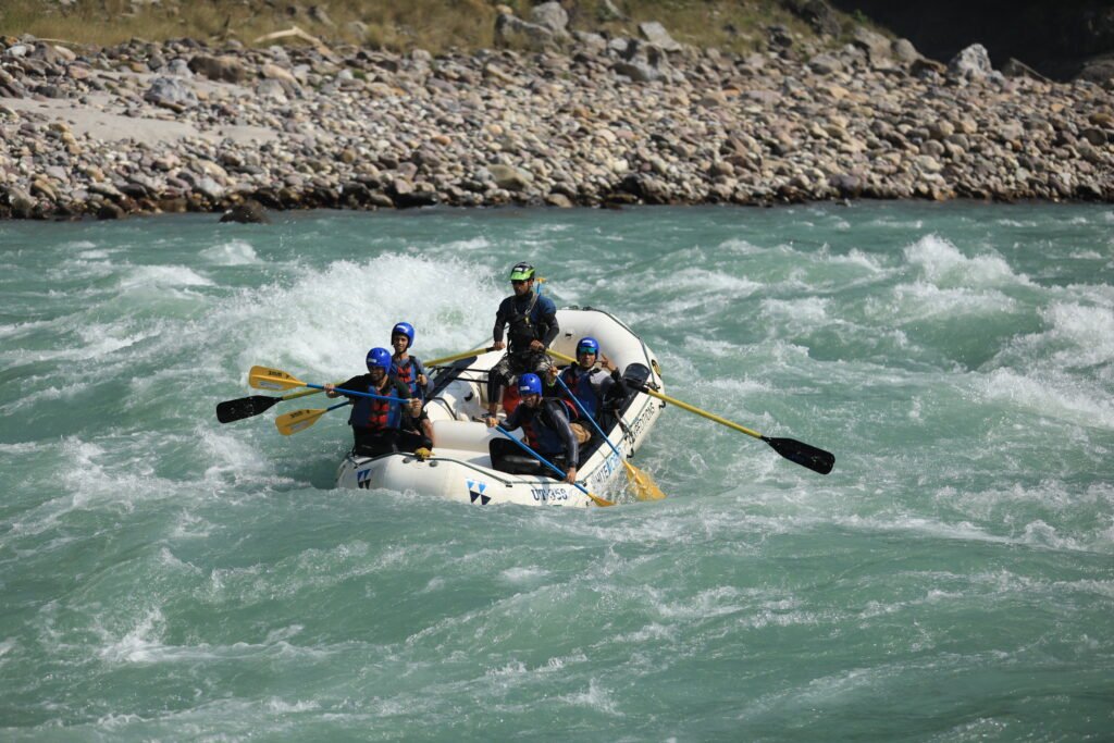 Shivpuri 16 km river rafting in Rishikesh through a rapid