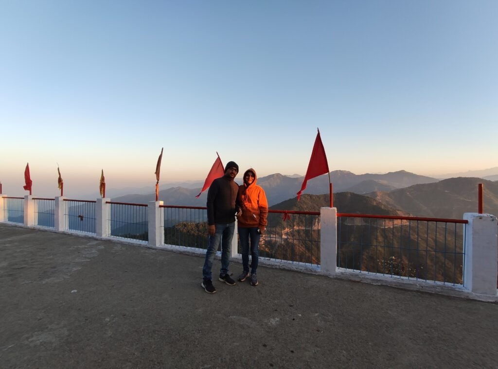 Trekkers at the top at sunrise on the Kunjapuri trek in Rishikesh