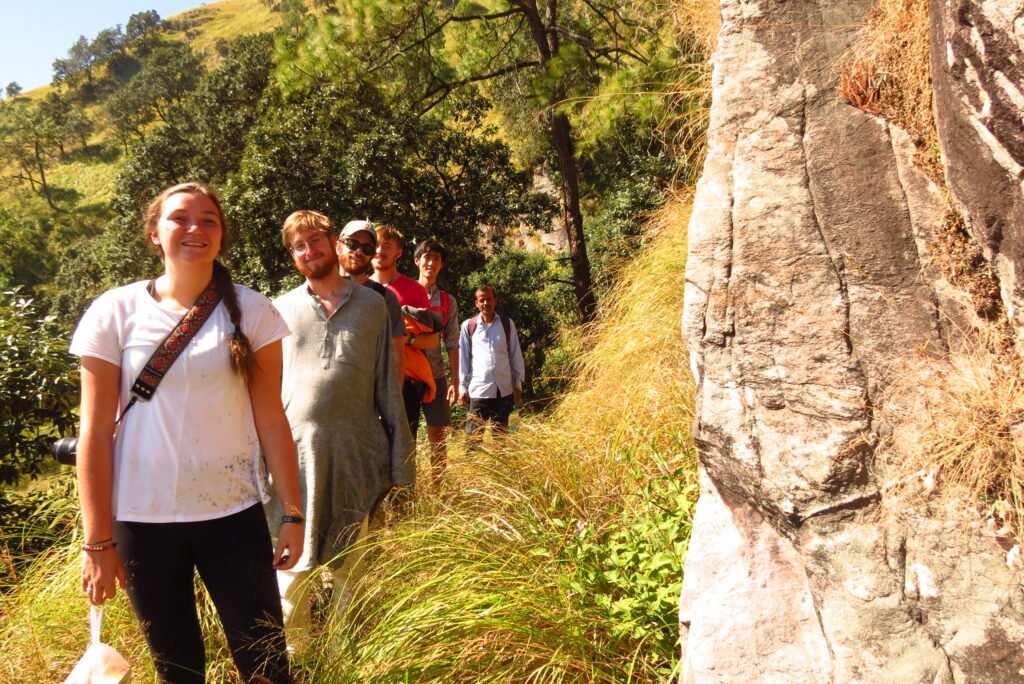 Trekking group on a forest trail on the Ranital trek near Rishikesh