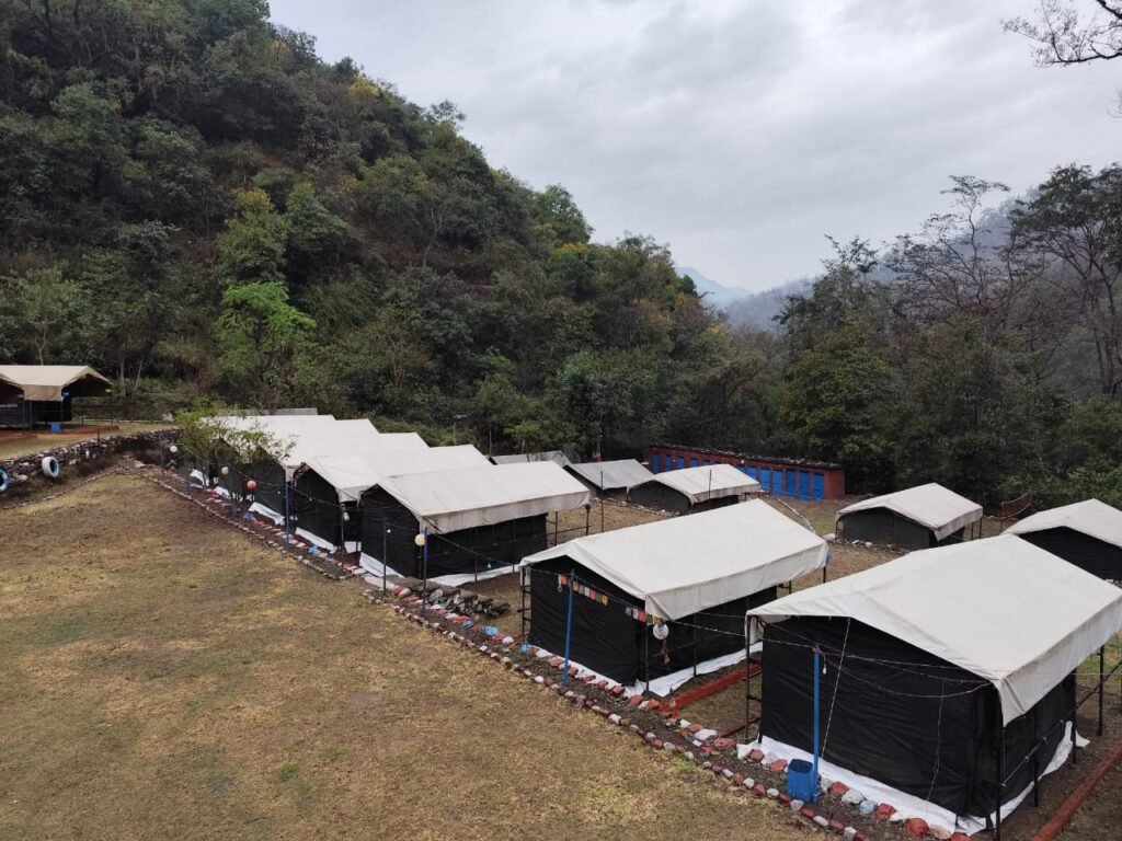 Tents at the White World Expeditions forest camp near Rishikesh, ready for November camping