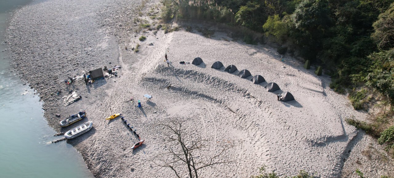 Aerial view of a riverside camp near Rishikesh on the Ganga