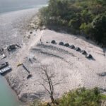 Aerial view of a riverside camp near Rishikesh on the Ganga